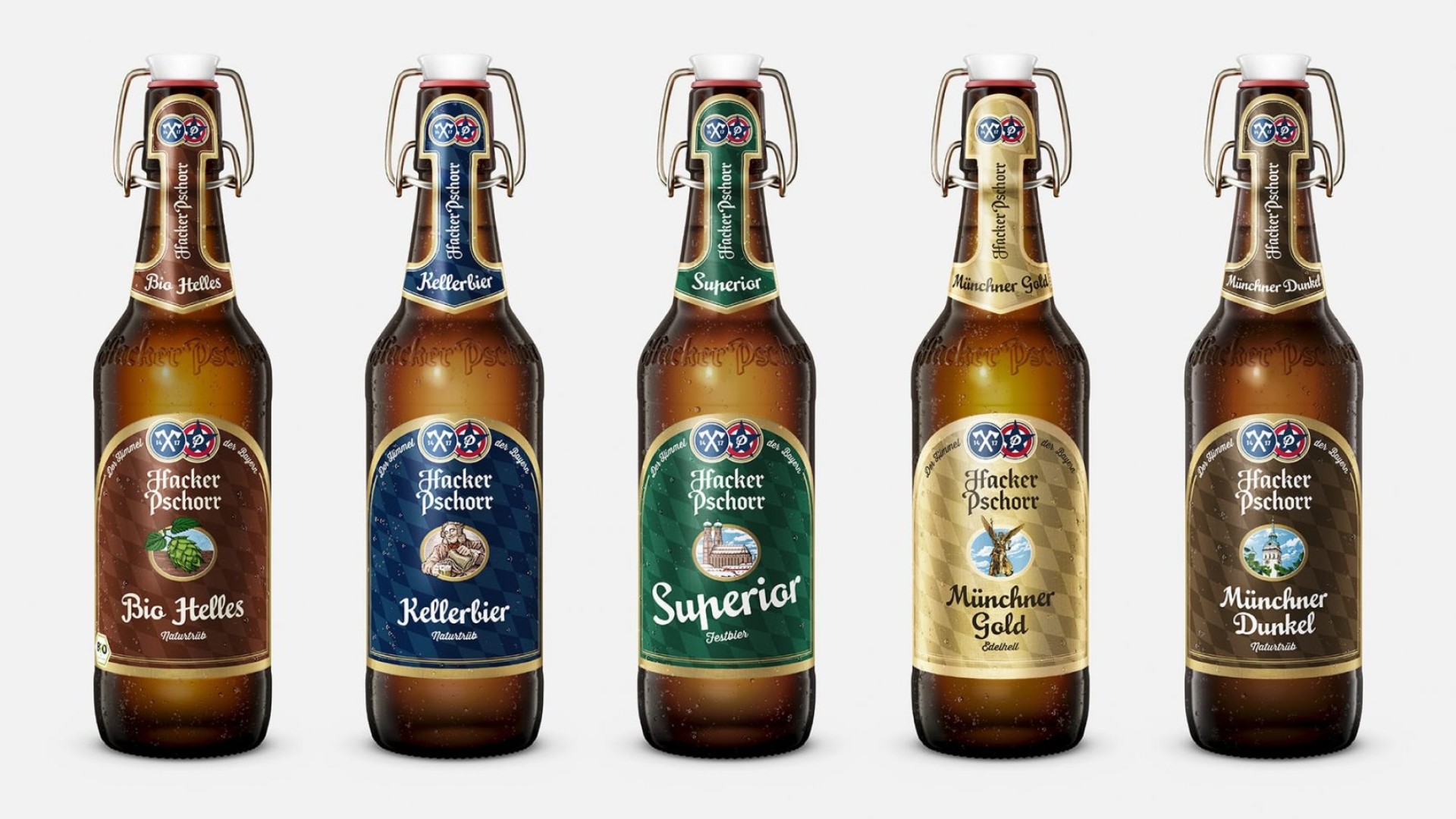 Fünf Flaschen Hacker-Pschorr-Bier: Bio Helles, Kellerbier, Superior, Münchner Gold und Münchner Dunkel.
