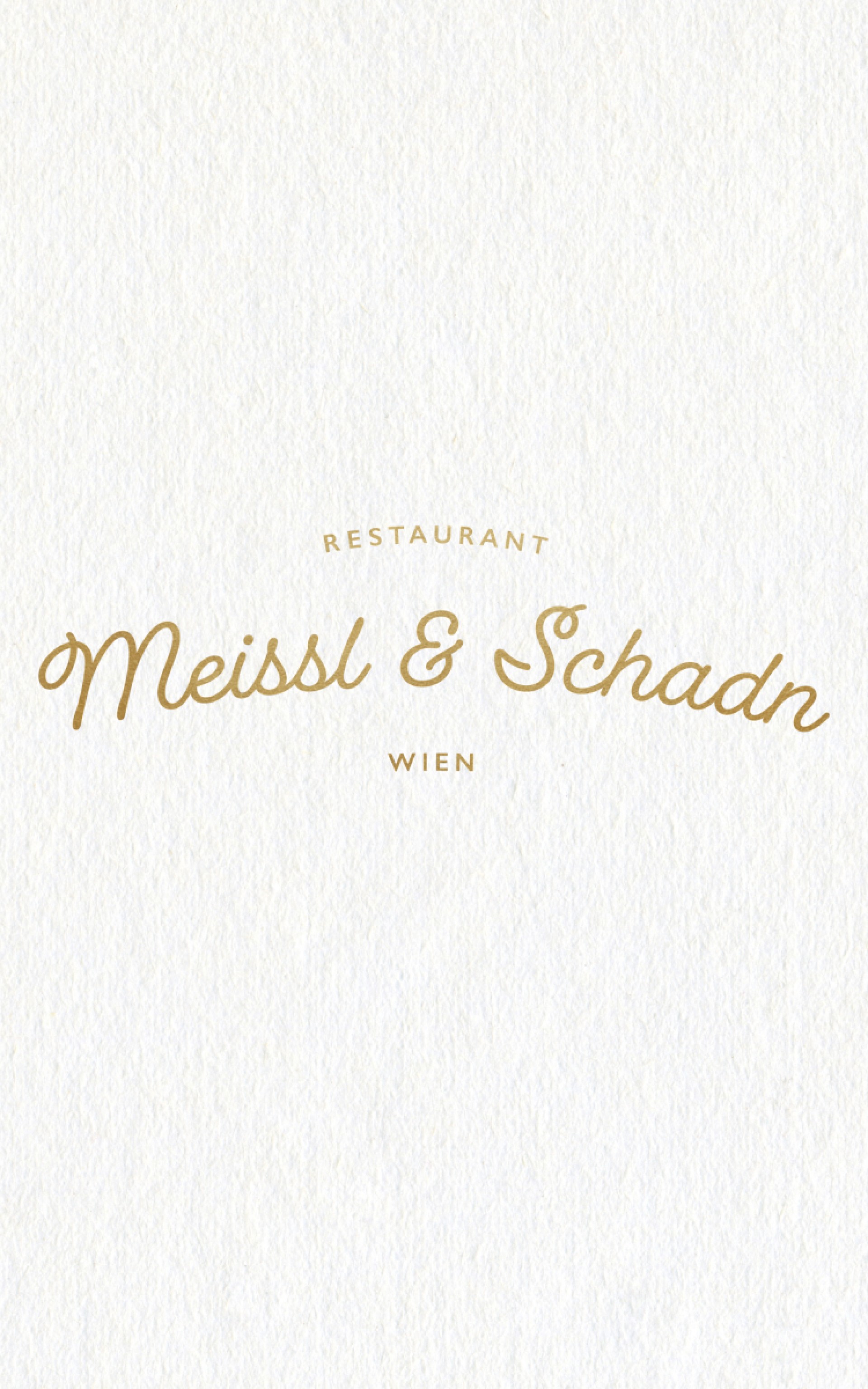 Restaurant Meissl & Schadn Wien in goldener Schrift auf weißem, strukturiertem Grund.