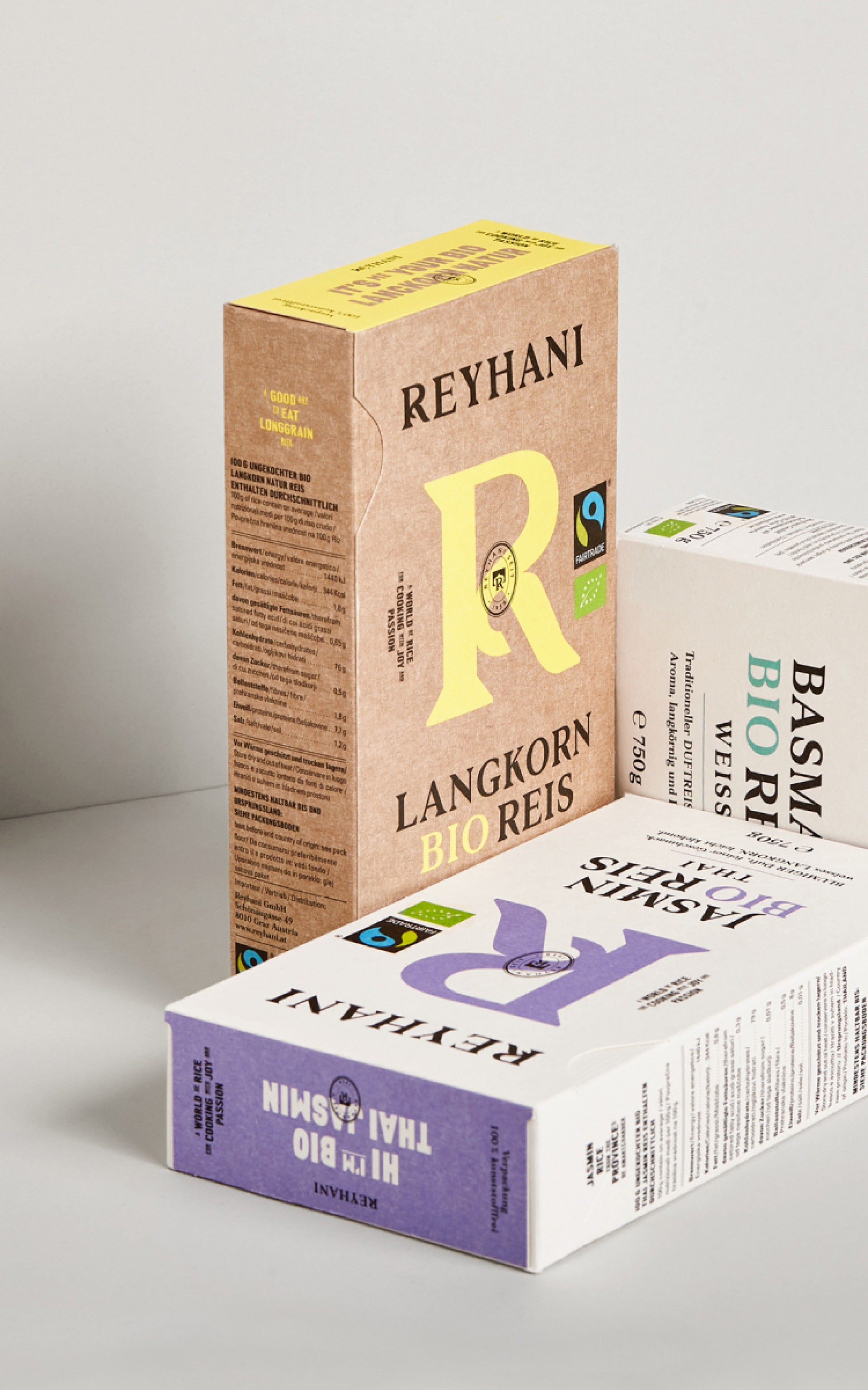 Drei Schachteln Reyhani Reis: Langkorn Bio Reis, Basmati Bio Reis Weiß, Hi I'm Bio Thai Jasmin.