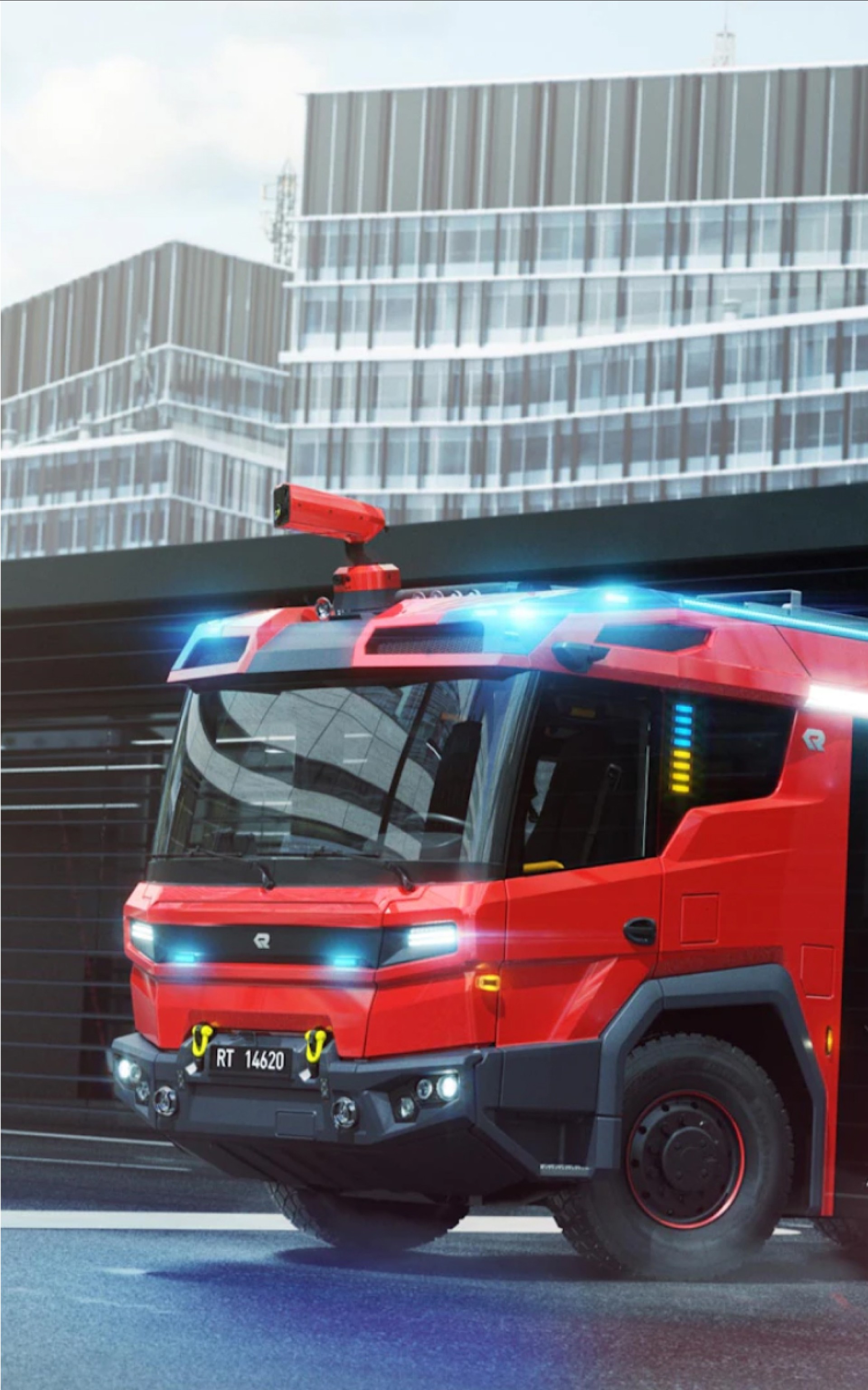 Roter Feuerwehrwagen RT 14620 mit blauen Lichtern und einem Hochhaus im Hintergrund.
