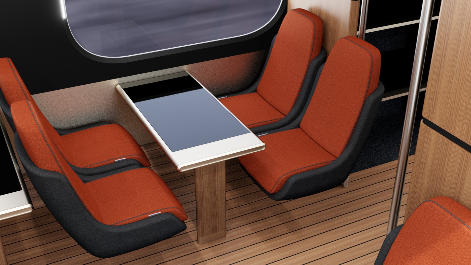 Innenraum eines Zuges mit orangefarbenen Sitzen und einem Tisch zwischen zwei Sitzen.