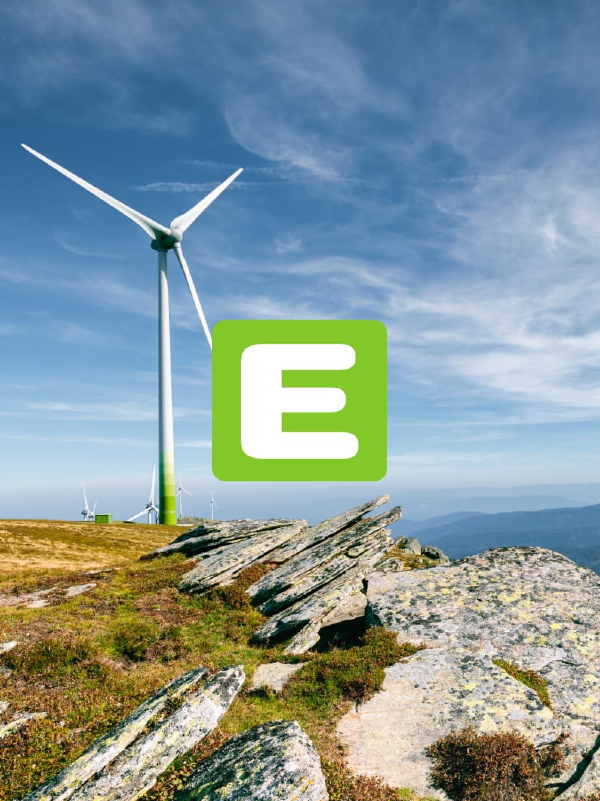 Windpark auf einem Hügel mit einem grünen "E"-Logo auf dem Bildschirm.