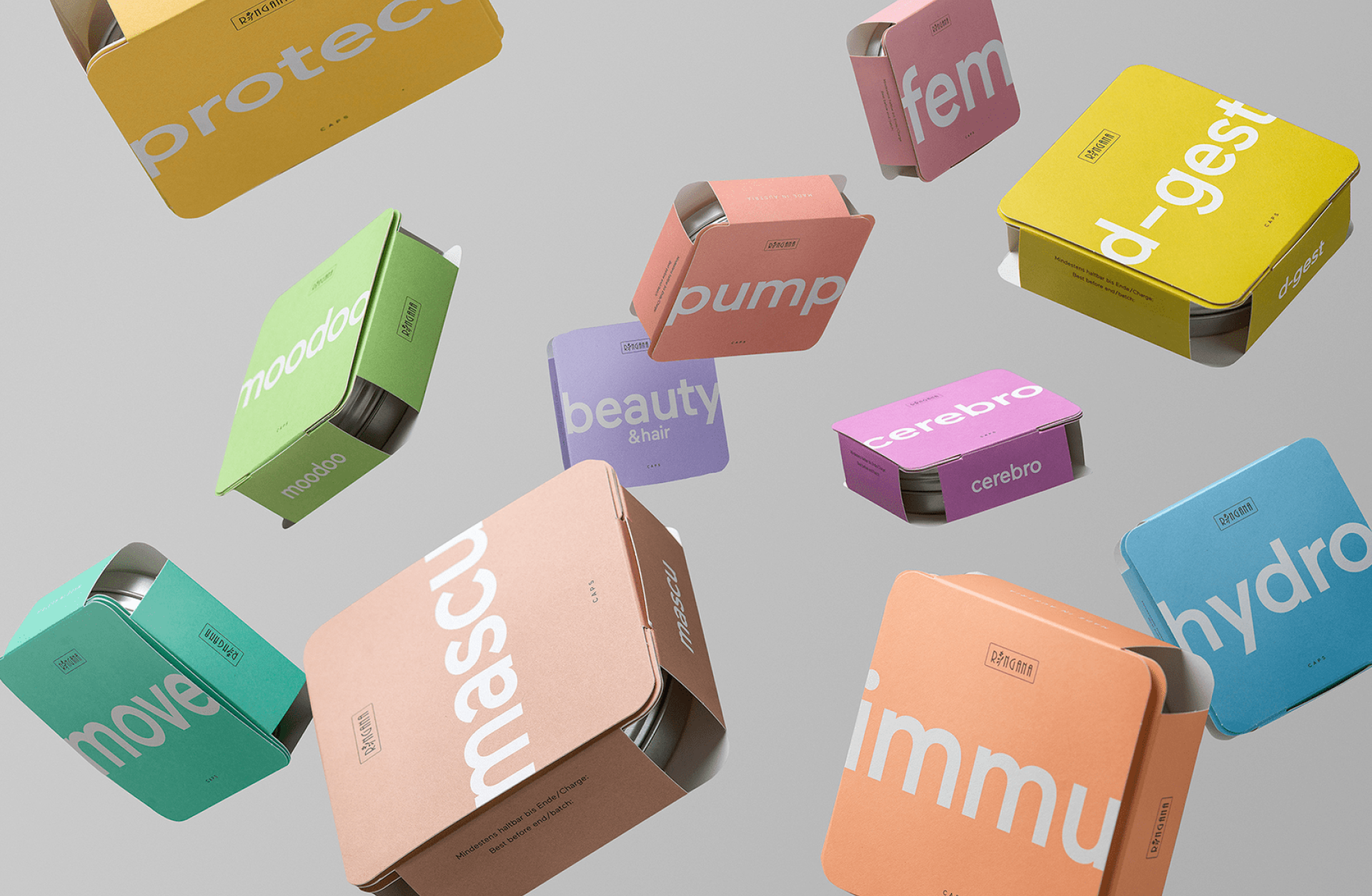 Verschiedene bunte "DRcaps"-Nahrungsergänzungsmittel-Behälter schweben mit Text wie "move", "protec", "moodoo", "pump", "beauty", "fem", "mascu", "cerebro", "immu", "d-gest" und "hydro".
